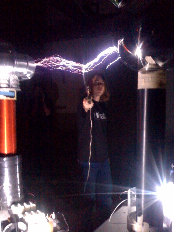 Catching lightning from two tesla coils